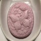 Butterfly among flowers (oval)